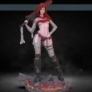 May include: A 3D-rendered figurine of a woman in a red hooded outfit, holding a large sword. The figure is posed on a rocky base with a fiery glow. The sword has a banner with text.
