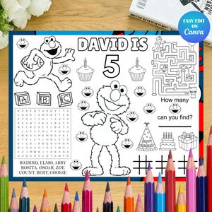 May include: A black and white coloring placemat featuring Elmo, cupcakes, and a maze. The text reads "DAVID IS 5" and includes a word search with Sesame Street characters. A fun activity for a child's birthday.