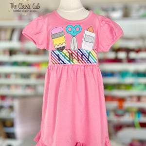 Pink School dress for girls, sweet school supplies design