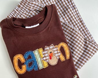 Thanksgiving-outfit voor jongens met shirt met kalkoennaam, optioneel gingangbroek