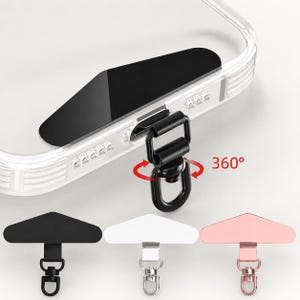 May include: A clear phone case attachment featuring a flat, triangular adhesive tab and a black swivel ring connector. The connector rotates 360 degrees. Below, three additional tabs are shown in black, white, and rose gold with matching rings.