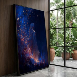 May include: Framed art print featuring a figure in a flowing robe, set against a dark blue background with golden stars and fiery accents. The artwork evokes a mystical or fantasy theme, with a sense of movement and light.