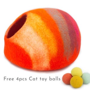 May include: Orange, yellow and pink felt cat bed shaped like a dome with a hole for entry. Free 4pcs cat toy balls.