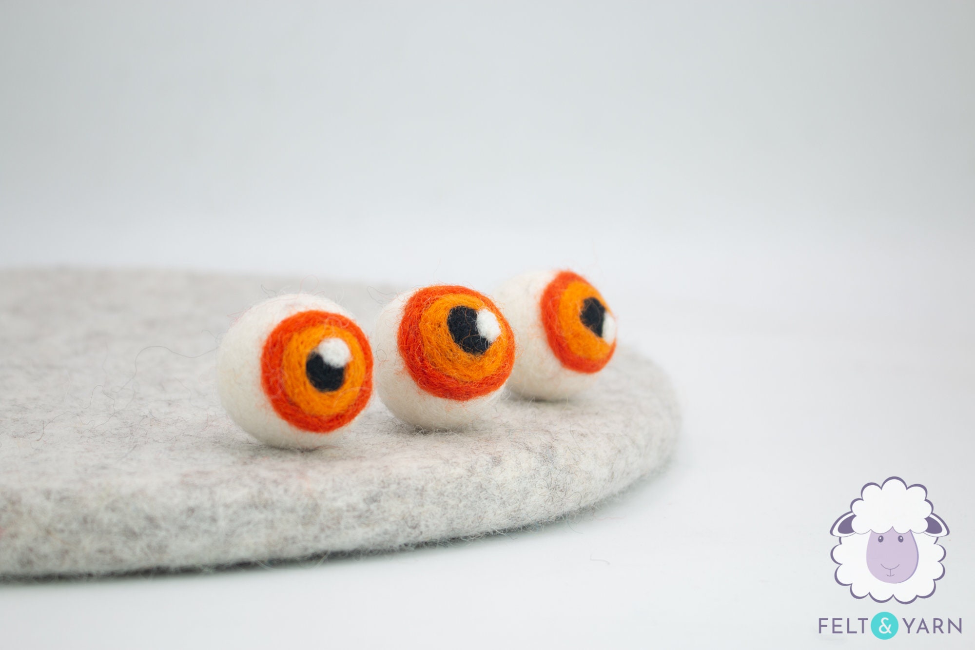 Fun Express Halloween Eyeball Wool Felt Pom-Poms - 12 Pieces