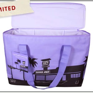May include: A lavender insulated tote bag with black graphics of palm trees and a building, with the text "Trader Joe's Market". The bag has a zippered top and lavender handles. The word "LIMITED" is on a tag.