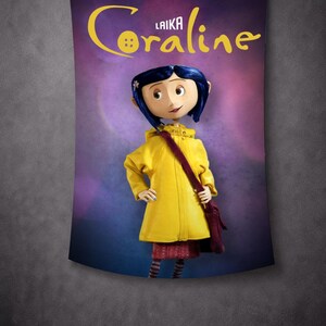 May include: A wall tapestry featuring the animated character Coraline from the movie. The character is wearing a yellow raincoat and carrying a maroon bag. The tapestry has the movie title in yellow script on a purple background.