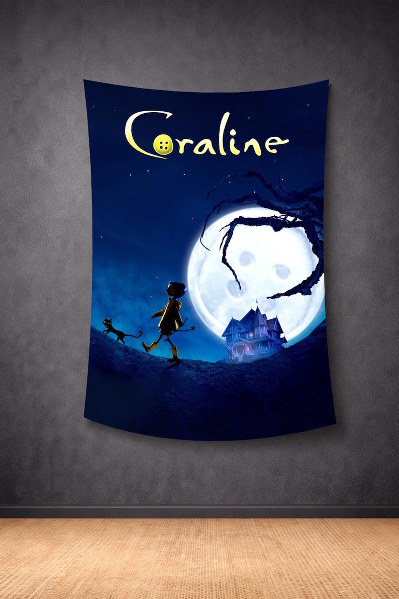 May include: A dark blue tapestry featuring the word "Coraline" in yellow script with a button as the letter "O". The image depicts a scene with a full moon, a silhouetted figure, a black cat, and a haunted house.