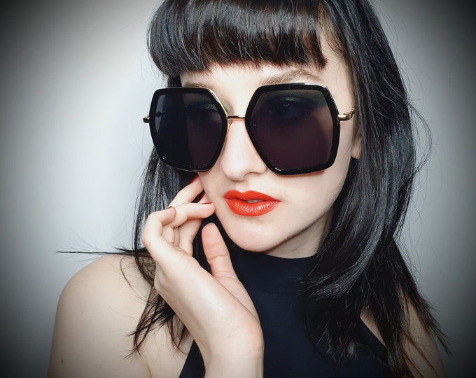 Designer Style Black and Gold over sized Sunglasses