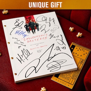 May include: A white script with signatures, the title "Inglourious Basterds", and a photo of actors. A yellow ticket and popcorn are on a red surface. The text "UNIQUE GIFT" is at the top.