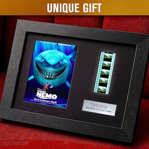 May include: A white ceramic mug with a black handle and the text "But First, Coffee" in a bold, black font. The mug is set against a blurred background, suggesting a cozy setting.