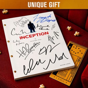 May include: A white movie script titled "Inception" with multiple signatures, a small illustration, and the text "Unique Gift." A yellow ticket and popcorn are also visible on a red surface.
