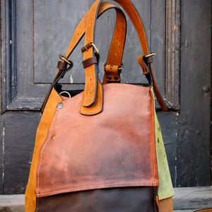 Leather handbag with two hand straps