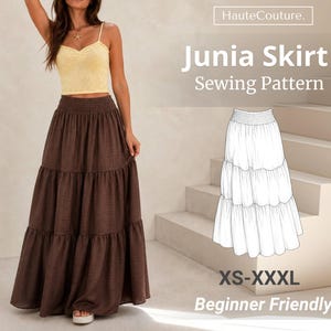May include: A brown tiered maxi skirt with an elasticized waistband, paired with a yellow camisole. The image includes text reading HauteCouture. Junia Skirt Sewing Pattern XS-XXXL Beginner Friendly and a white line drawing of the skirt.
