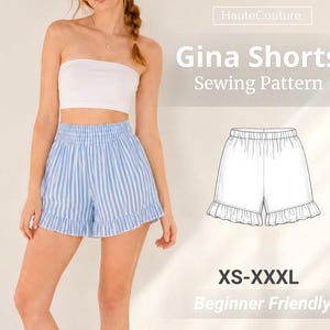 Può includere: Un cartamodello per Gina Shorts con un top a fascia bianco e pantaloncini a righe blu e bianche con vita elastica e orlo a volant. La grafica include il testo HauteCouture, Gina Shorts Sewing Pattern e le taglie XS-XXXL.