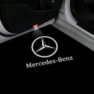 May include: A set of three ceramic mugs with a speckled, matte finish. Each mug features a different color: light blue, cream, and gray. The mugs have a simple, modern design and a comfortable handle. Perfect for coffee or tea.