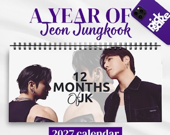 May include: A 2027 spiral-bound calendar titled A YEAR OF Jeon Jungkook, featuring photographic portraits of the artist. The cover displays the text 12 MONTHS Of JK. A purple smartphone case with white text and a rose gold pen are positioned nearby.