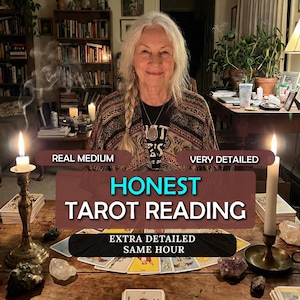 May include: An image of a woman with long gray hair, smiling, with a table in front of her. The table has tarot cards, candles, and crystals. Text on the image reads "HONEST TAROT READING" and "REAL MEDIUM".