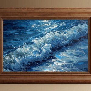 Puede incluir: Pintura enmarcada de una ola rompiendo en el océano. La obra de arte presenta tonos de azul y blanco, capturando el movimiento y la textura del agua. El marco es de madera marrón oscuro.