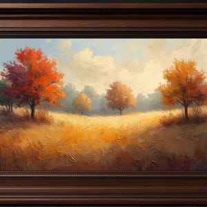 May include: A framed landscape painting depicting an autumn scene. The artwork features vibrant orange and red trees set against a golden field under a cloudy sky. The frame is a dark brown color.