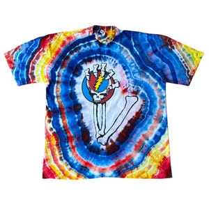 May include: Tie-dye t-shirt with a colorful spiral design in red, yellow, blue, and white. The shirt features a graphic of a skull with a lightning bolt and bones. The shirt is a short-sleeved, casual top.