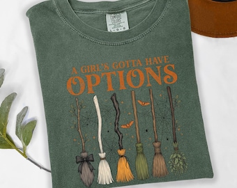 A Girl’s Gotta Have Options Shirt, Funny Witch Broom Tee, Halloween Witch Humor Shirt, Spooky Feminist Witch Tee