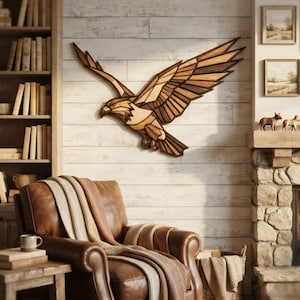 May include: A wall-mounted eagle sculpture crafted from layered wooden panels in varying shades of brown and tan. The eagle is depicted in a dynamic flying pose with wings fully extended, showcasing geometric segments and natural wood grain textures.