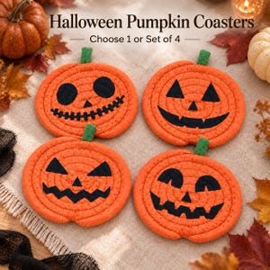 May include: Four round orange pumpkin coasters made of coiled rope with green stems. Each coaster features a unique black fabric jack-o'-lantern face. The text "Halloween Pumpkin Coasters" and "Choose 1 or Set of 4" is visible at the top.