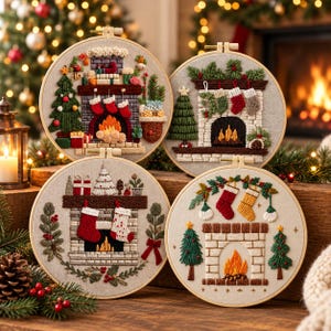 May include: Four circular embroidery hoops featuring detailed needlework of Christmas fireplaces. Each hoop displays a unique hearth scene with stockings, decorated Christmas trees, and glowing fires stitched onto light-coloured fabric.