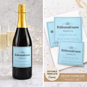 May include: A black Prosecco bottle with a gold foil top and a light blue label that reads "Bridesmaid name Prosecco". Two champagne flutes are to the left. Light blue labels with the same text are to the right.