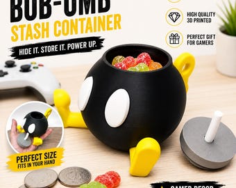 May include: A black spherical stash container with white oval eyes and yellow feet, resembling a Bob-omb character. It includes a grey circular lid with a white stem, filled with colorful gummy candies, alongside silver coins on the surface.