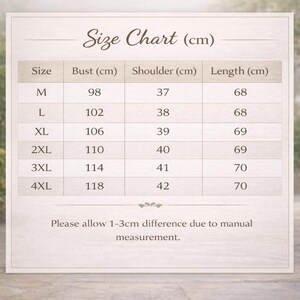 May include: A cream-coloured size chart labelled "Size Chart (cm)". It details bust, shoulder, and length measurements in centimetres for sizes M to 4XL. The text at the bottom reads, "Please allow 1-3cm difference due to manual measurement."