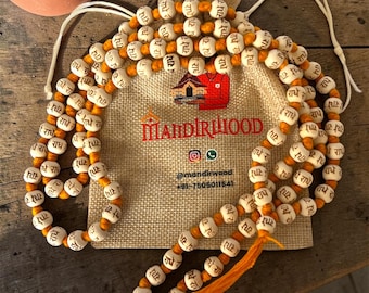 108 Beads Tulsi Japa Mala – Radhe Radhe Engraved Wooden Rosary (MandirWood Potli)