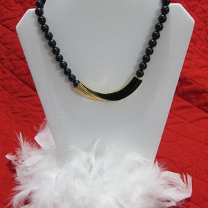 Trifari Black and Gold Tone Enamel Pendant Necklace