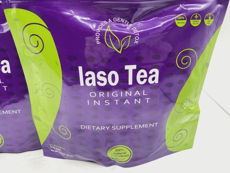 Pode incluir: Uma embalagem roxa de suplemento alimentar "laso Tea". A embalagem tem detalhes verdes com espirais e as palavras "ORIGINAL INSTANT" em branco. A embalagem tamb&eacute;m indica "100% ingredientes naturais".