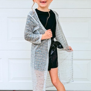 sheer silver jacket to wear over dress 10 Jackets to Wear Over Dresses