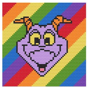 May include: A cross-stitch design featuring a purple character with yellow eyes and orange horns, set against a diagonal rainbow background. The design is square and pixelated, with a cartoonish aesthetic.