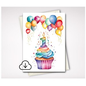 May include: A greeting card featuring a watercolor illustration of a cupcake with rainbow-colored frosting and a number one candle on top. Above the cupcake are numerous colorful balloons in shades of red, yellow, blue, green, and purple.