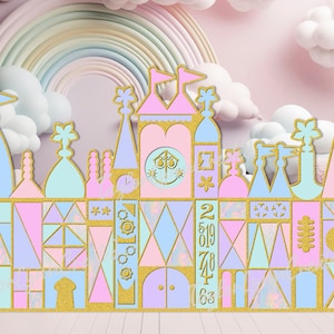 May include: A pastel pink, blue, and yellow castle backdrop with gold accents and a clock face. The castle has a whimsical design with geometric shapes and a rainbow arch in the background.