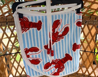 Falda pareo de toalla junto al mar