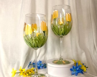 Yellow tulips hand painted pair of beautiful wine glasses.  Personalizable for gift giving and free shipping always