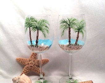 Free and fast shipping  Beach theme palm tree pair of hand  wine glasses personalizable for gifting