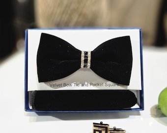 Conjunto de pajarita de terciopelo de lujo para hombre y alfiler de solapa con flor en color negro.