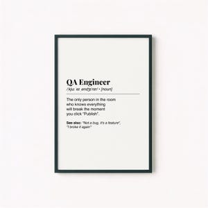 May include: A framed print with a black border and a white background. The text reads "QA Engineer" with a definition and humorous statements about the role. The print is a humorous gift for software quality assurance professionals.