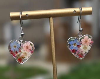 Silver heart shaped dried flower earrings, forget-me-not and narcissus