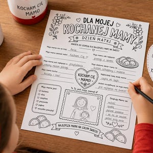 May include: A black and white Mother's Day questionnaire with the text "For My Beloved Mom" and "Best Mom in the World." A child is writing on the paper with a pencil. A mug with "I Love You Mom" is in the background.