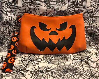 Jackolantern wristlet clutch bag spooky jack-o’-lantern pumpkin bag spooky scary