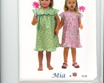 Mia is a Little Girl's Dress with a curved yoke fromChildrens Corner         New Unused