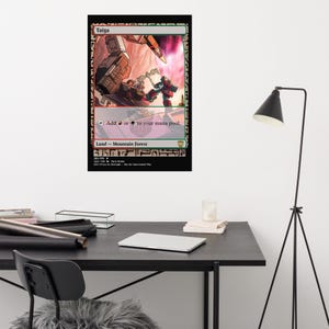 May include: A framed poster of a Taiga Magic: The Gathering card. The artwork shows a battle scene with a red and green robot-like figure. The card text includes "Add or to your mana pool" and "Land - Mountain forest."