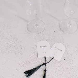 Rehearsal dinner place cards for the bride and the groom