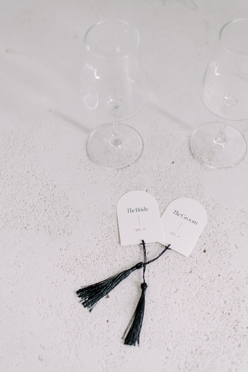 Rehearsal dinner place cards for the bride and the groom